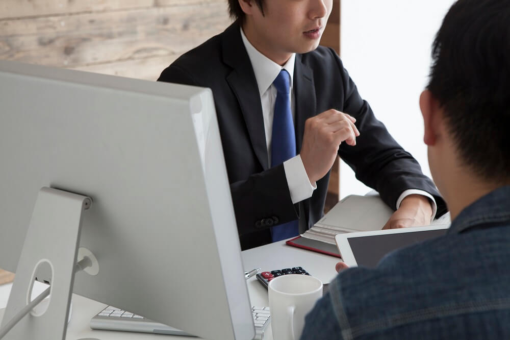 Businessman negotiating his merchant cash advance with the lender